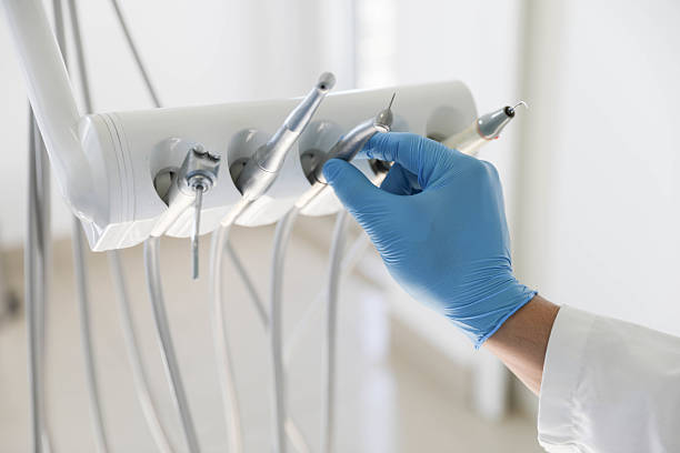 Professional Emergency Dentist technician working in Rome, GA